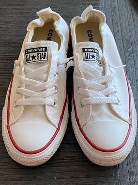 Women’s slip-on Converse All Star White Canvas Low Top Sneakers with Red Trim